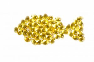 L'huile de poisson en capsules pour chien